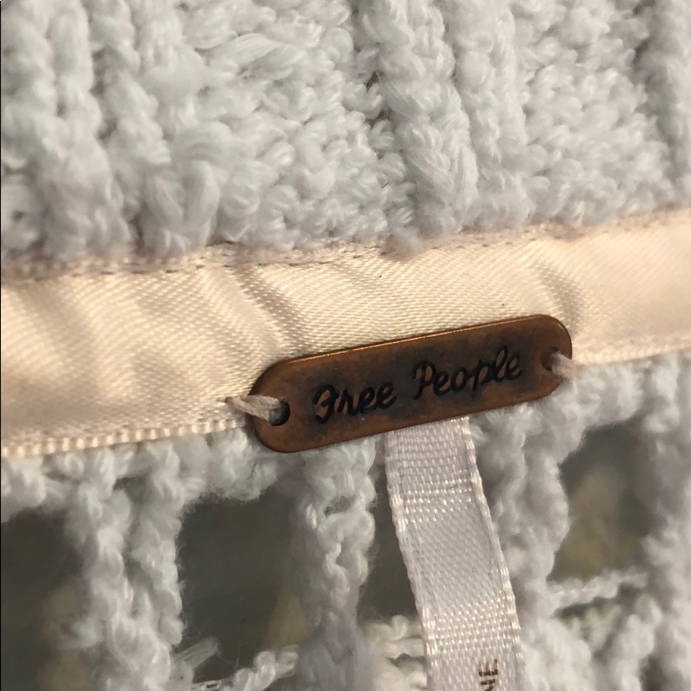 White oversized knitted belled sweater